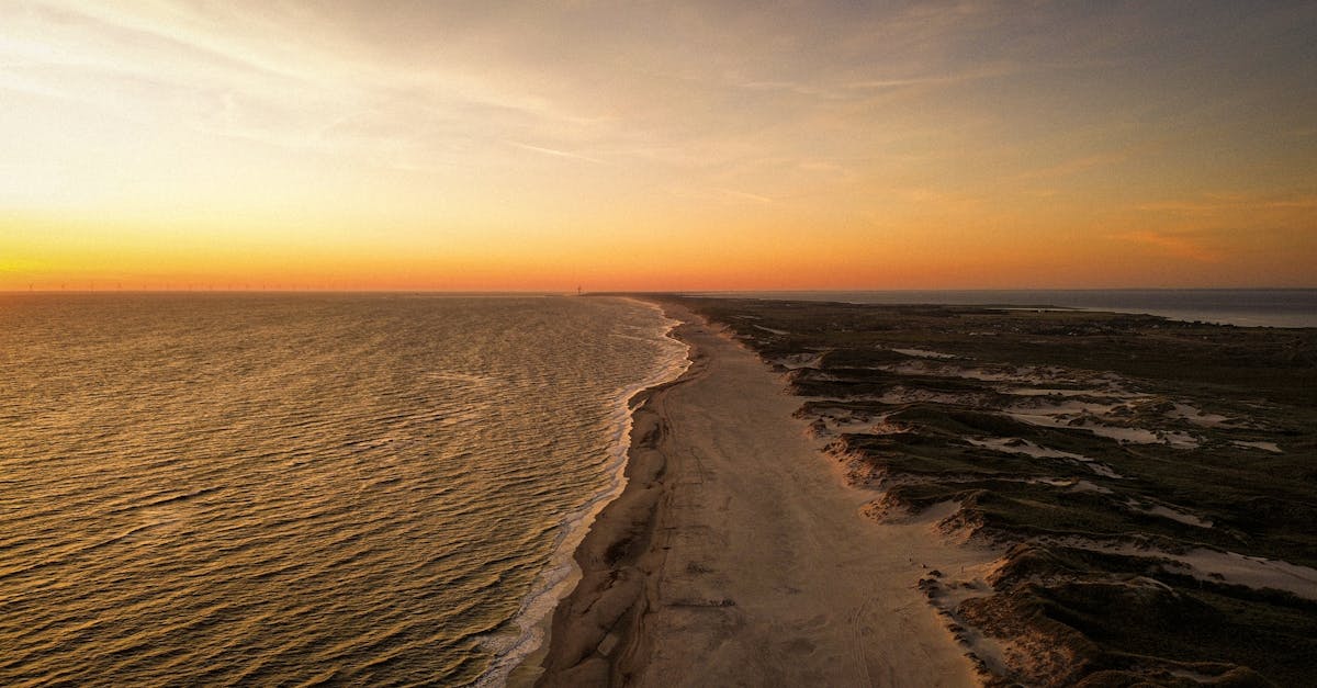 experience the breathtaking beauty of a beach sunset with vibrant colors and peaceful waves, perfect for relaxation and memorable moments.