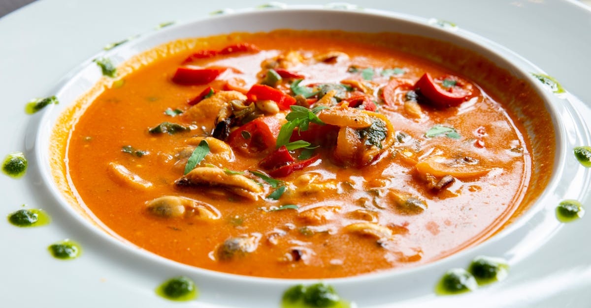 discover the rich flavors of bouillabaisse, a traditional provençal seafood stew from marseille, featuring a variety of fresh fish, aromatic herbs, and spices in a savory broth.